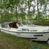  Onze boot afgemeerd met het dak open